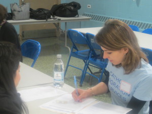 A woman filling out an application