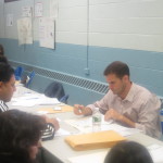 A man filing out an application