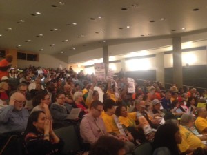 Room with people at the Hearing