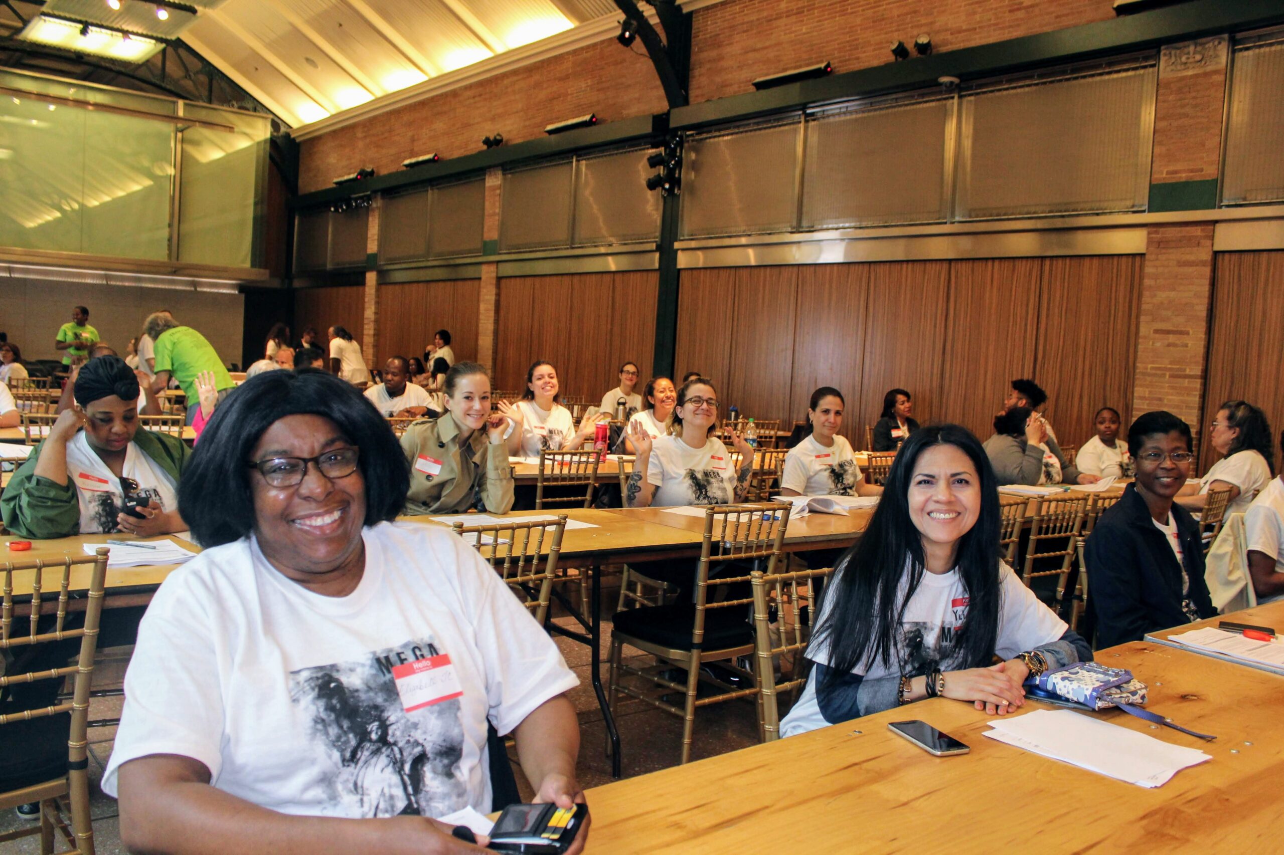 Women Posing Sitting at Tables