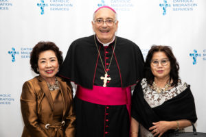 Two Women posing with the Bishop at Shining Stars